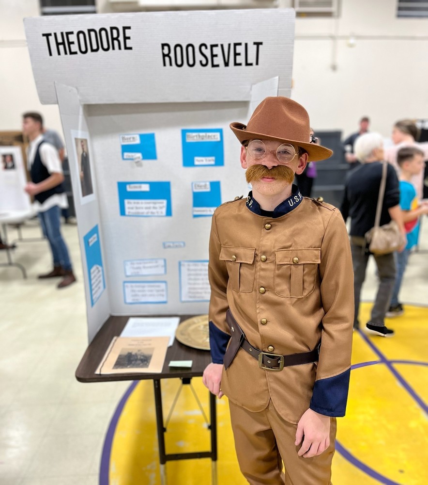 Student Dressed as Theodore Roosevelt for Middle School Wax Museum Event