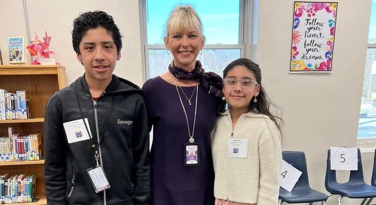 Dr. Fay Sprouse Pictured with two Super Speller Students