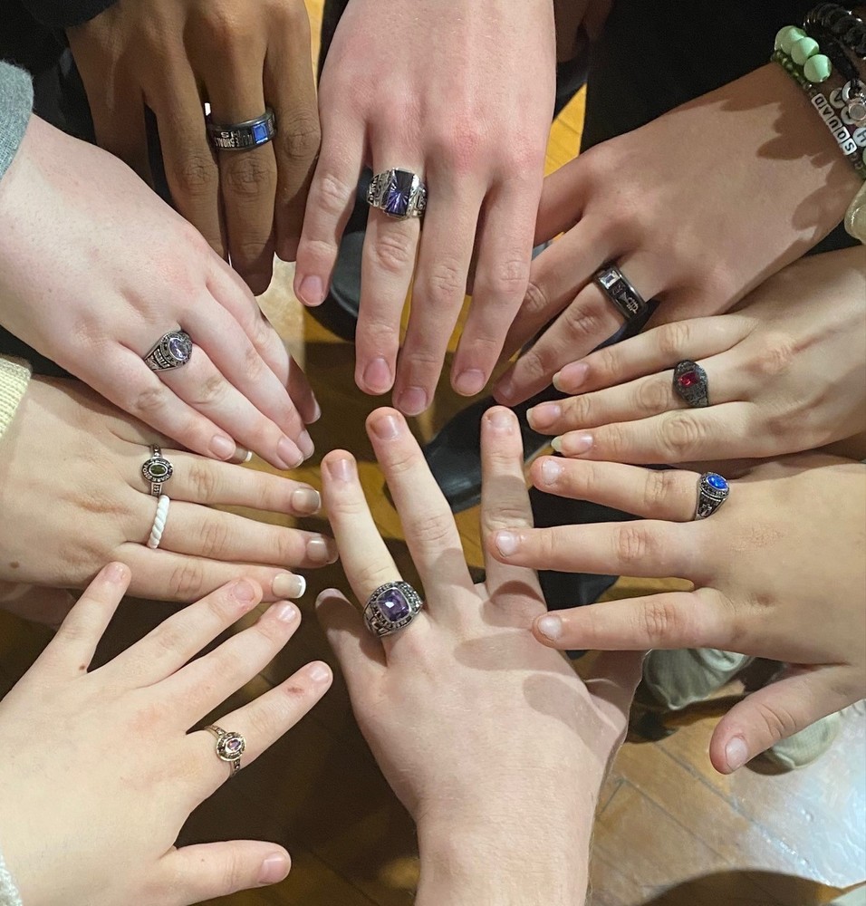 Students Hands showing class rings