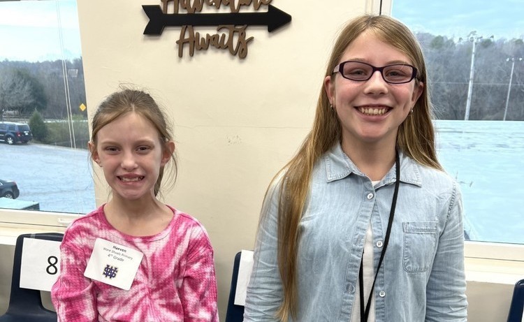 Two Middle School  Student Spelling bee winners pictured